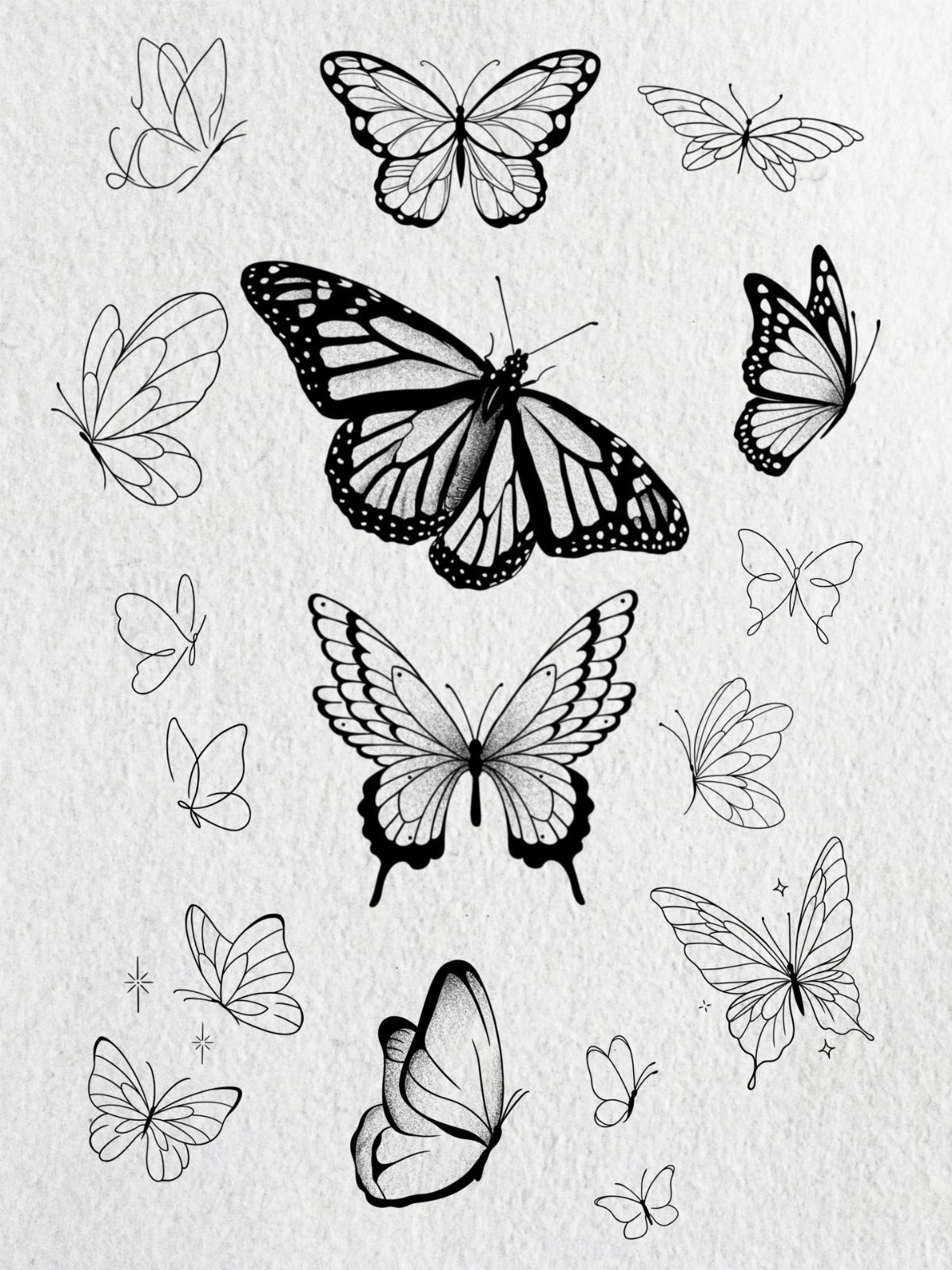 Black ink butterfly illustrations in various styles scattered on a light textured paper background.